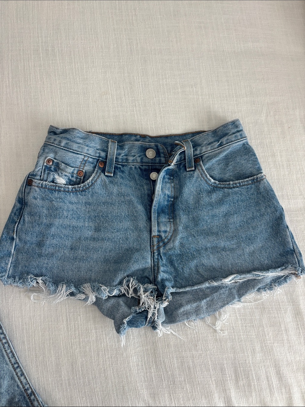Levi's Light Blue Distressed High-Rise Denim Shorts